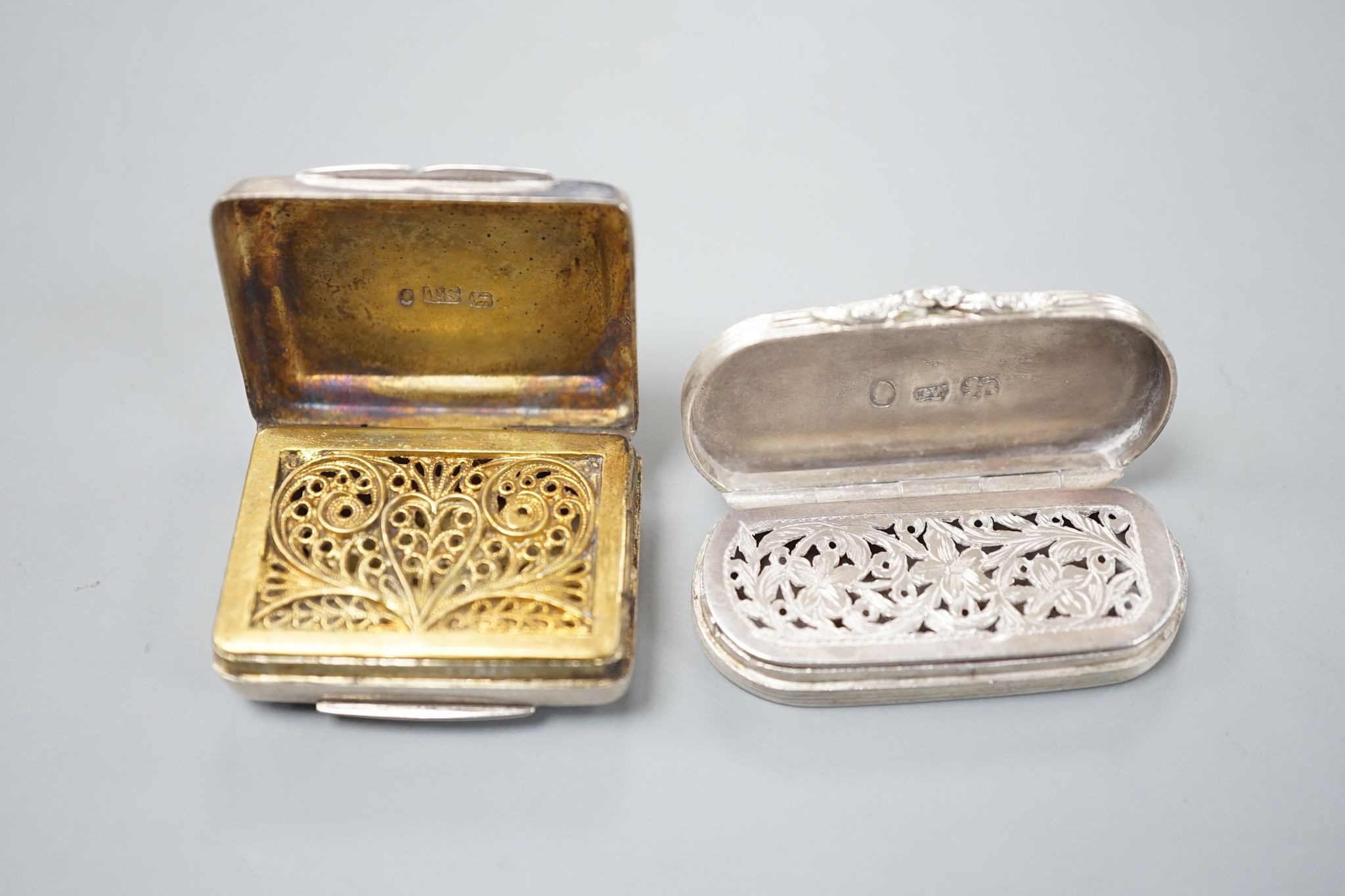 An early Victorian engraved silver oval vinaigrette, by Gervase Wheeler, Birmingham, 1837, 40mm, with engraved inscription and one other silver vinaigrette, Birmingham, 1835.